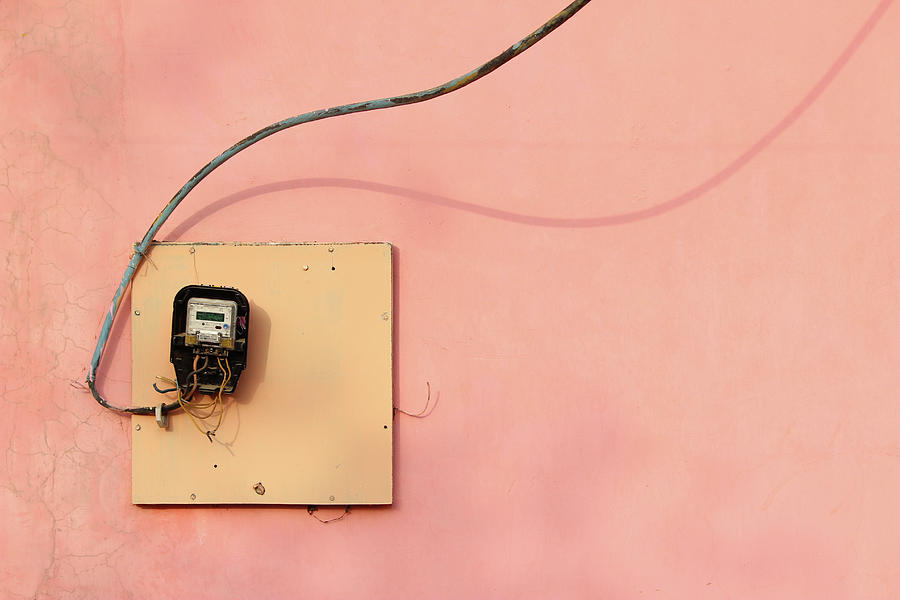 Electric Meter on Pink Wall Photograph by Prakash Ghai