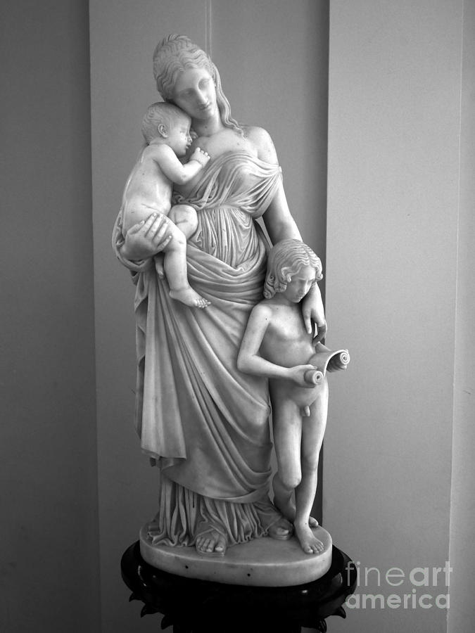 Elegant Carved Statues 2 Photograph by Lexa Harpell