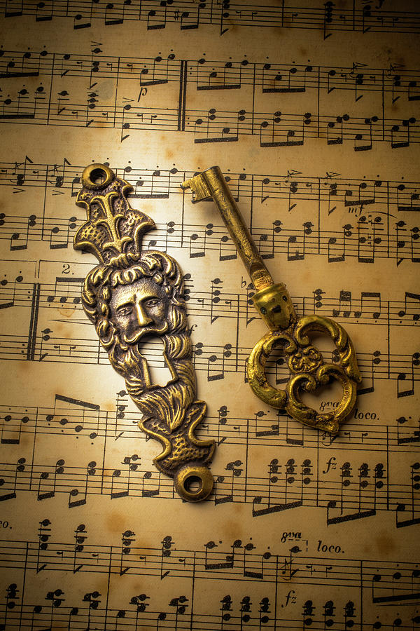 Elegant Keyhole And Sheet Music Photograph by Garry Gay