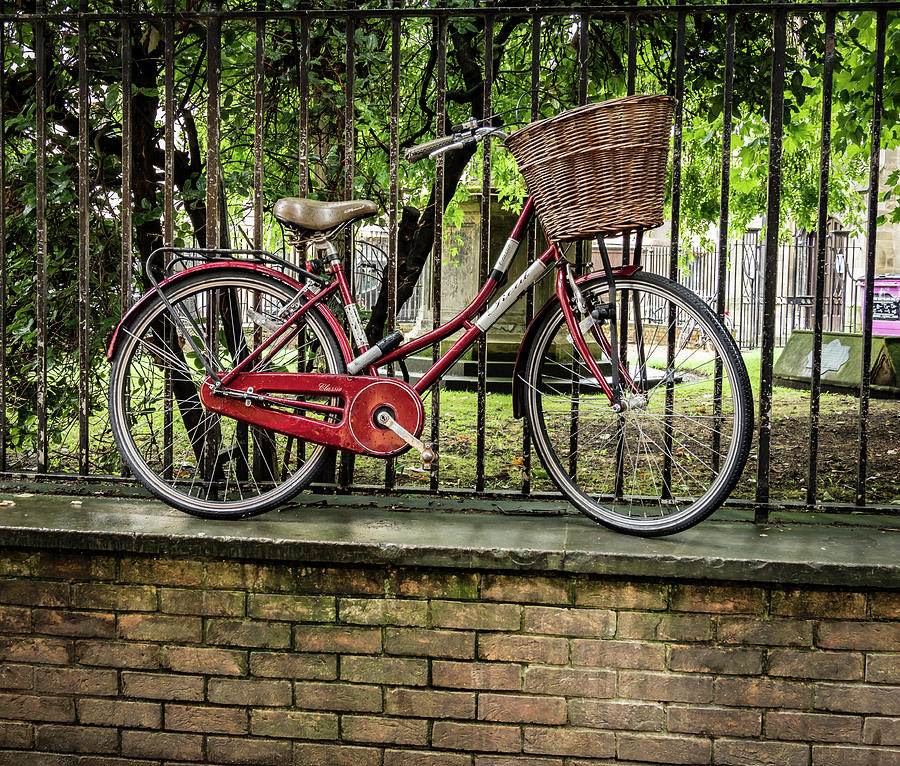 Transportation Photograph - Elevated Red Bike by Jean Noren