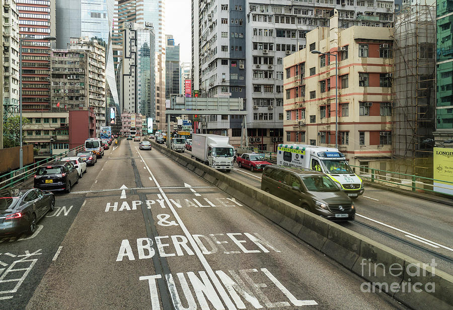 Elevated road in the very crowded Causweay Bay district in Hong  Photograph by Didier Marti