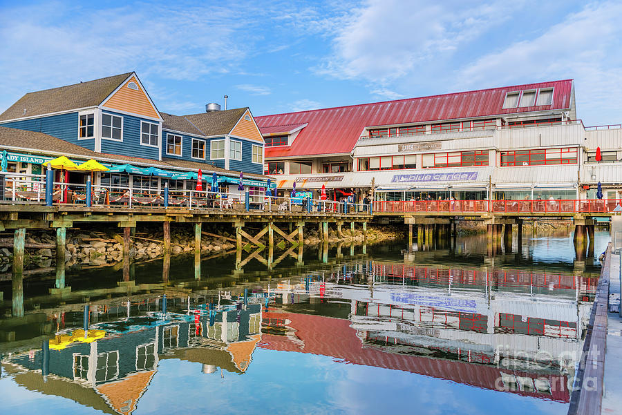 Embankment with cafes and restaurants in the fishing village Photograph ...