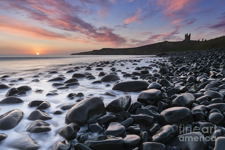 Nature Photograph - Embleton Bay and Dunstanburgh Castle at dawn by Rod McLean
