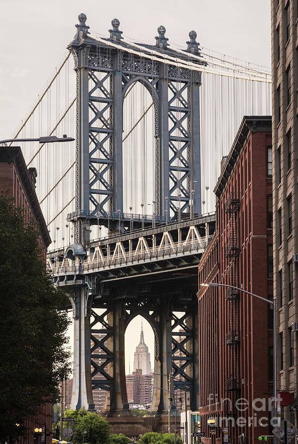 Empire State Building and Manhattan bridge in New York Photograph by Didier Marti