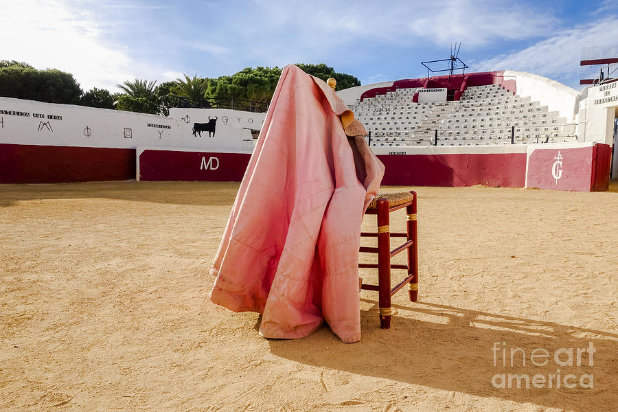 Empty Bullring, chair and cape Photograph by Perry Van Munster