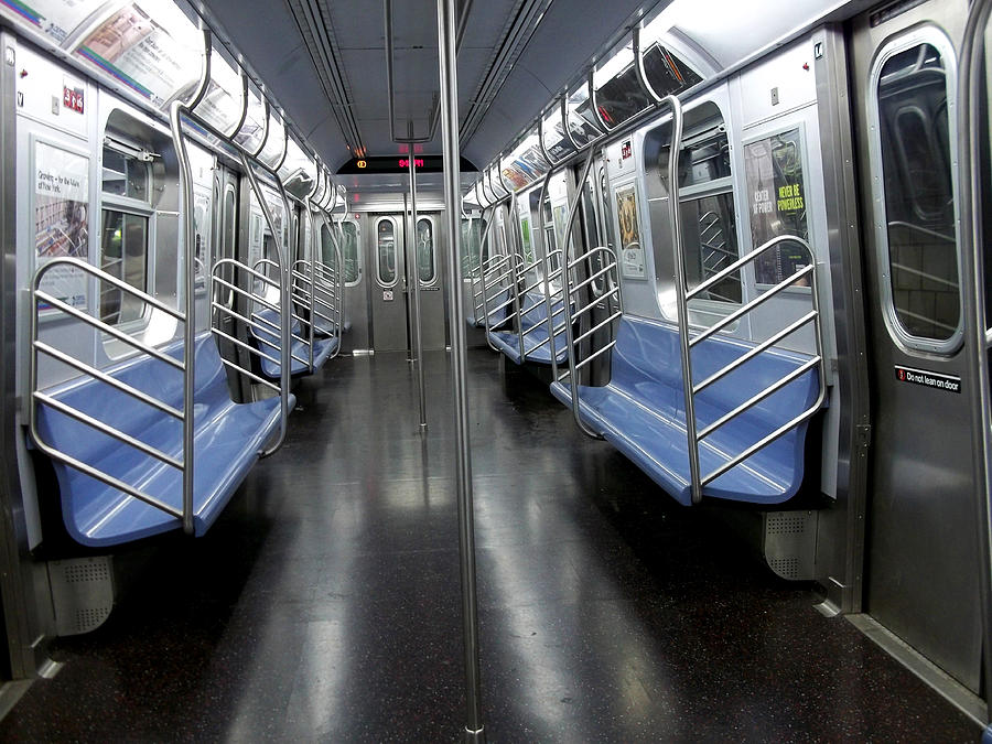 Empty E Train Photograph by Yolanda Lee - Fine Art America