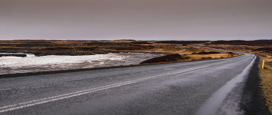 Empty Icelandic country road in winter Photograph by Michalakis Ppalis