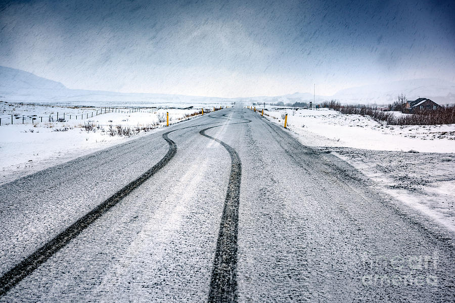 Empty snowy highway Photograph by Anna Om