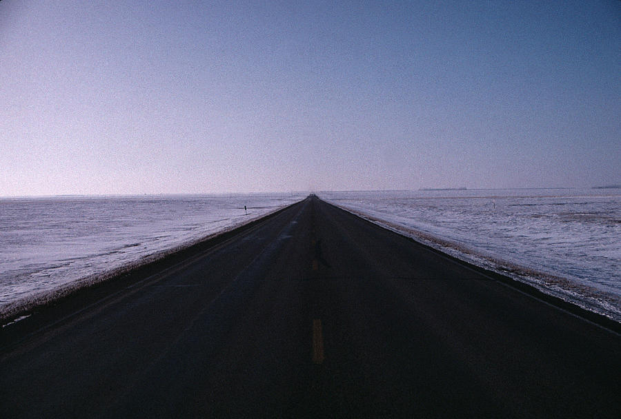 Endless Winter Road Photograph by William Kimble