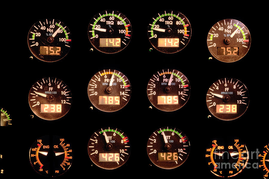 Engine Dials for the Twin Engine Dash-8 Turboprop Plane Photograph by Wernher Krutein