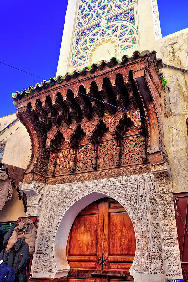 Entrance of a mosque in old style and a magnificent wooden gate and mosaic ornaments Photograph by Gina Koch