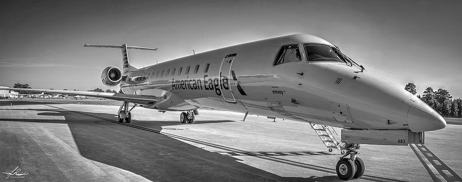 Black And White Photograph - Envoy Embraer Regional Jet by Phil And Karen Rispin