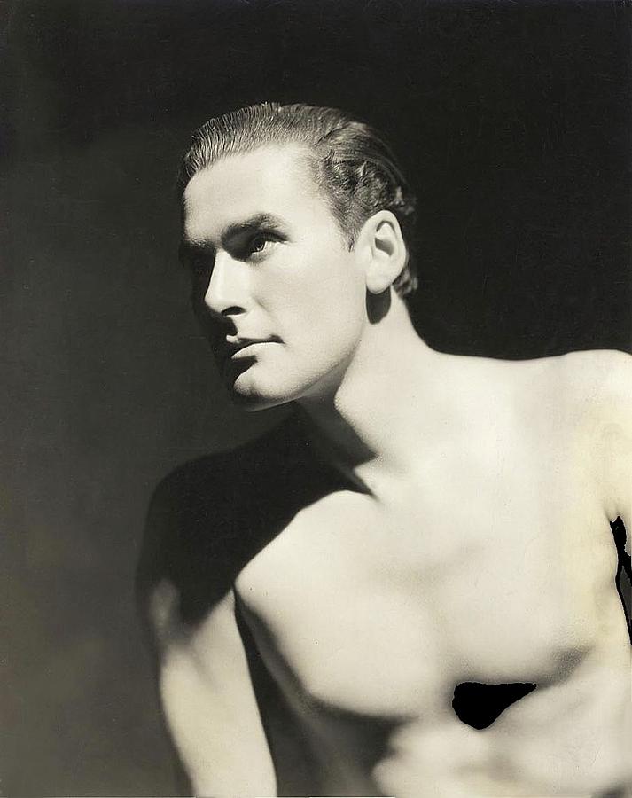 Errol Flynn beefcake pose from the mid 1930s. Photograph by David Lee Guss