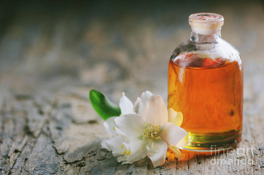 Homemade Essential Oil With Jasmine Flower Photograph