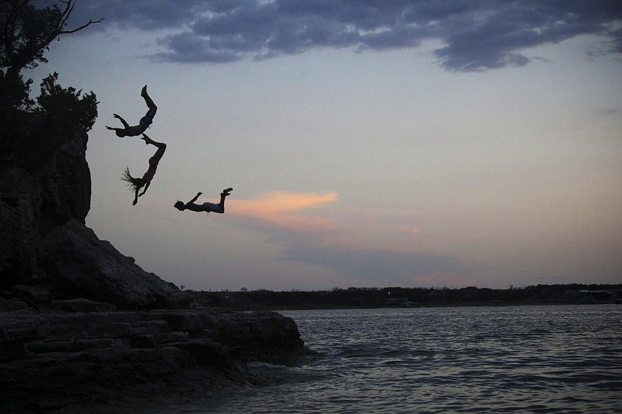 Evening Cliff Jump Photograph by Emily Olson