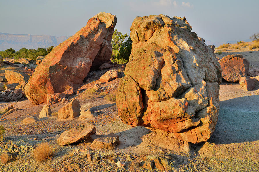 Evening Light on Boulders in Bentonite Site Photograph by Ray Mathis
