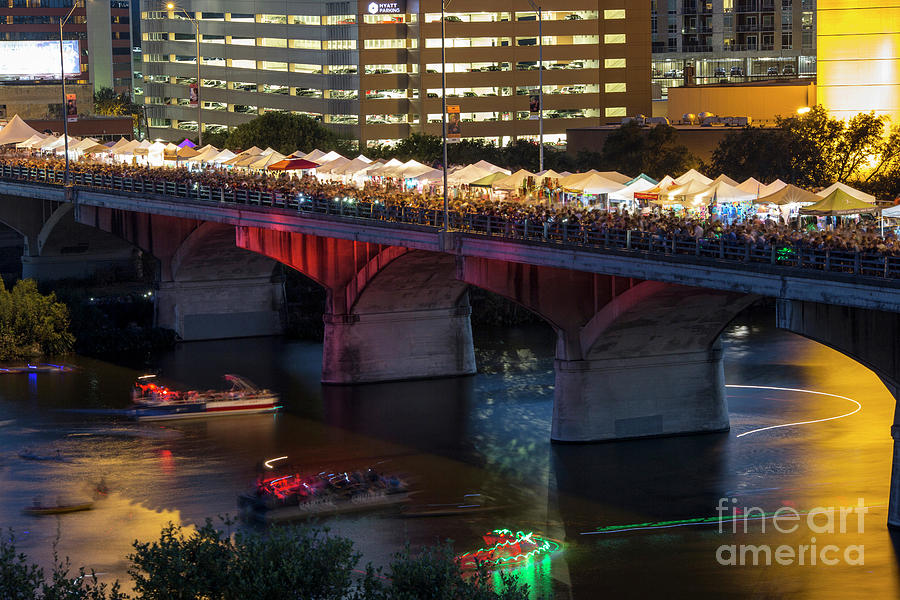 Night Photograph - Evening view of the Congress Avenue Bridge as thousands of Austinites flock to the Austin Bat Fest by Dan Herron
