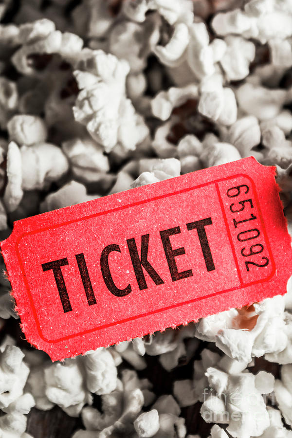 Event Ticket Lying On Pile Of Popcorn Photograph