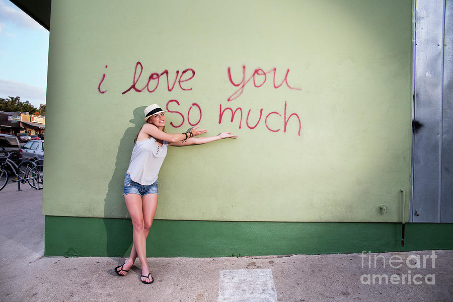 Austin Photograph - Every day there are thousands of smiling photos, kissing photos, and goofy photos taken in front of the I love you so much by Dan Herron