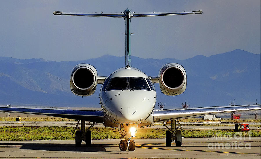 Expressjet Airlines Embraer EMB-145XR Commuter Jet Photograph by Wernher Krutein