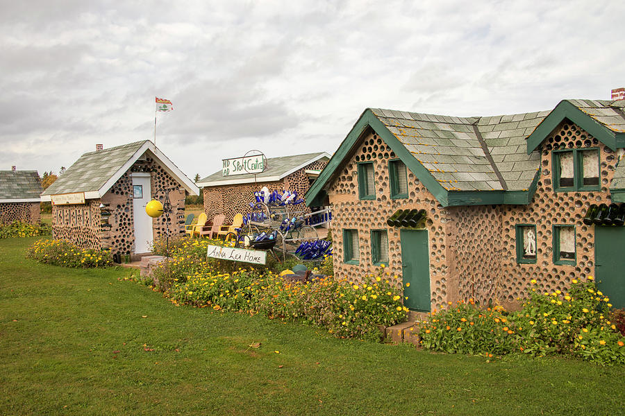 Exterior of cottages at Hannahs Bottle Village, PEI, Canada Photograph by Karen Foley