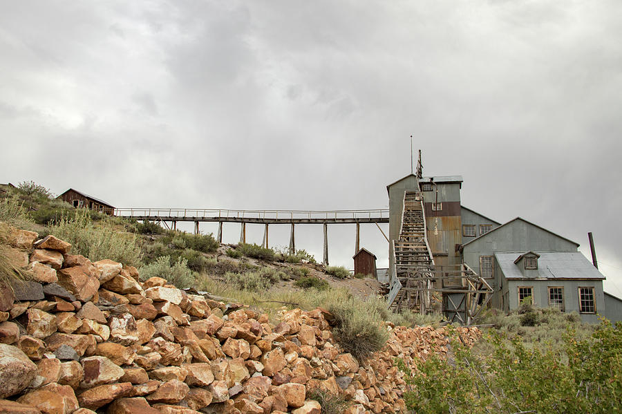 Exterior of Stamp Mill with rail tracks, Bodie, California Photograph by Karen Foley