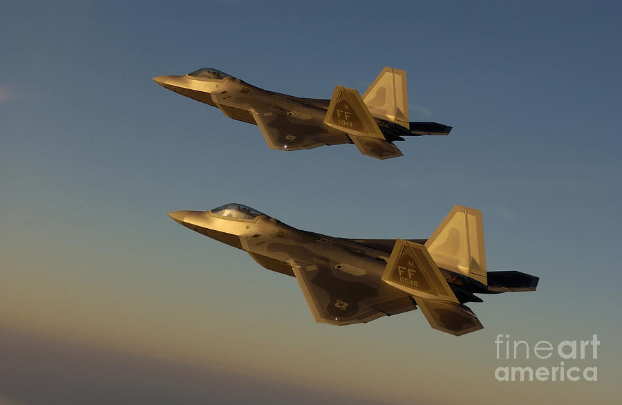 Airplane Photograph - F-22a Raptors Fly Over Langley Air by Stocktrek Images