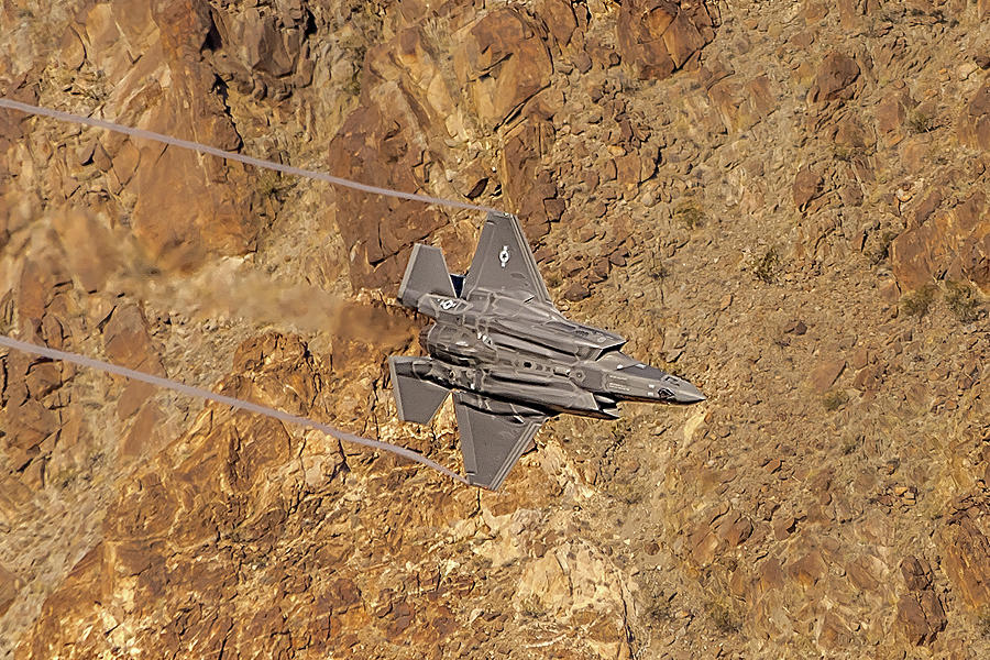 F35 Lightning Vertical In The Valley Photograph by Bill Gallagher