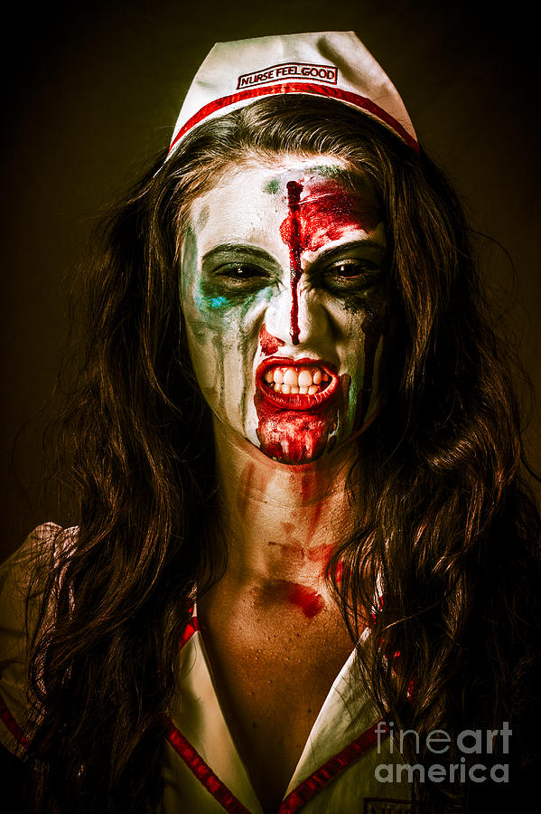 Face of a scary woman in a horror nurse costume Photograph by Jorgo Photography