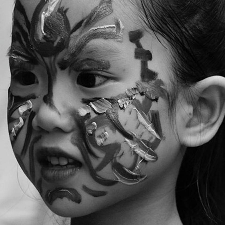 Portrait Photograph - Face Painted Girl From Hanoi Creative by Jesper Staunstrup