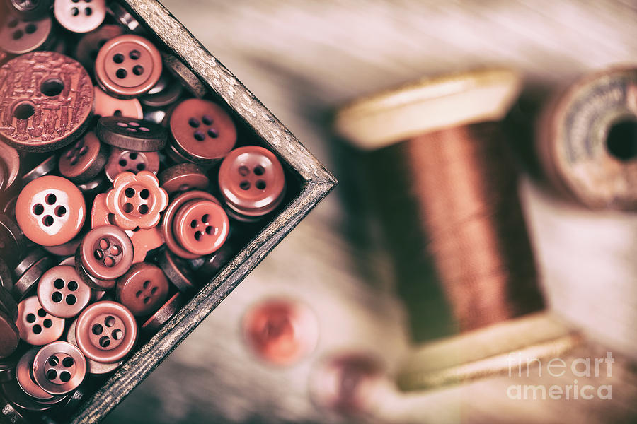 Faded retro styled red buttons and thread Photograph by Jane Rix
