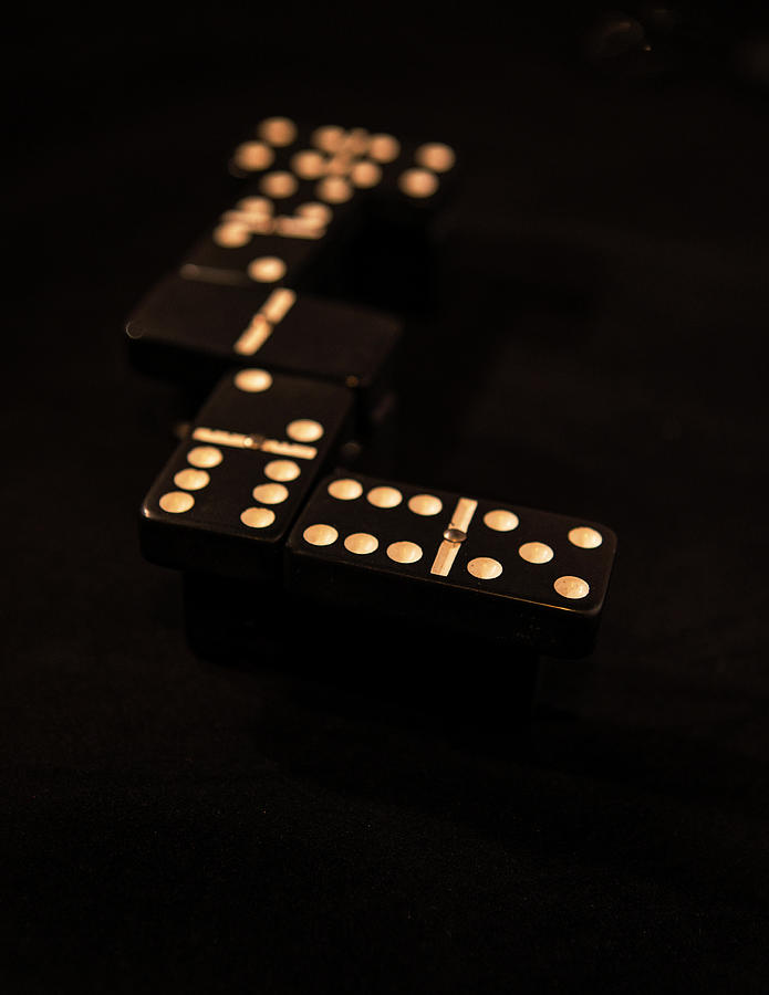 Fading Dominos Photograph by Jeff Kurtz
