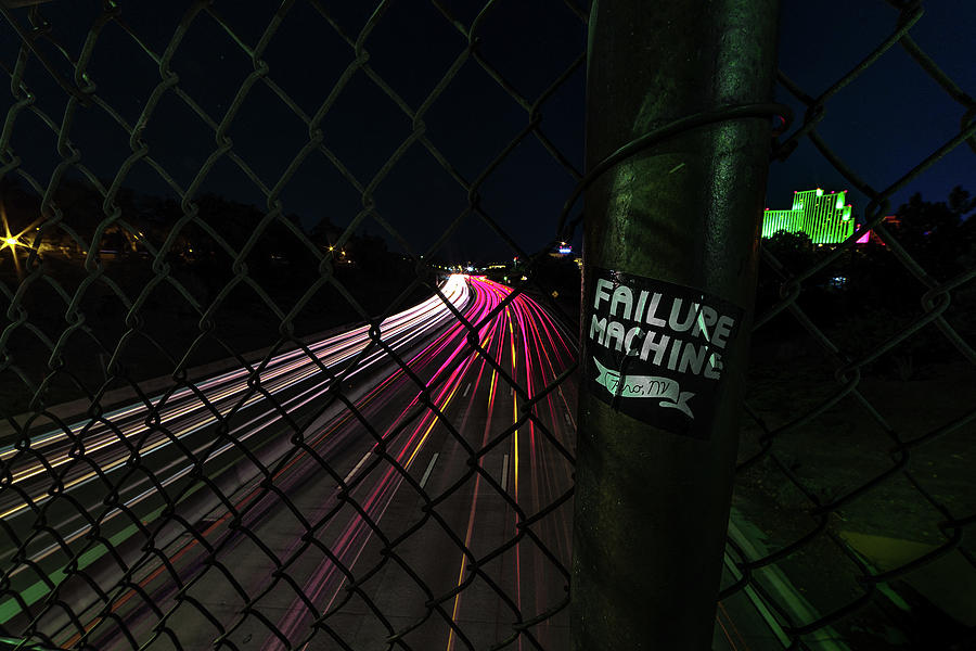 Failure Machine Sticker On Pole Overlooking I-80 Downtown Reno, Nevada On A Summer Night In July Photograph