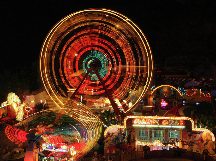 Fair in Motion Photograph by Art Cole