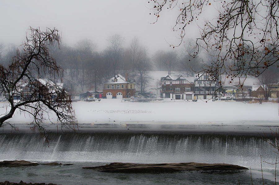 Fairmount Dam and Boathouse Row in the Snow Photograph by Bill Cannon