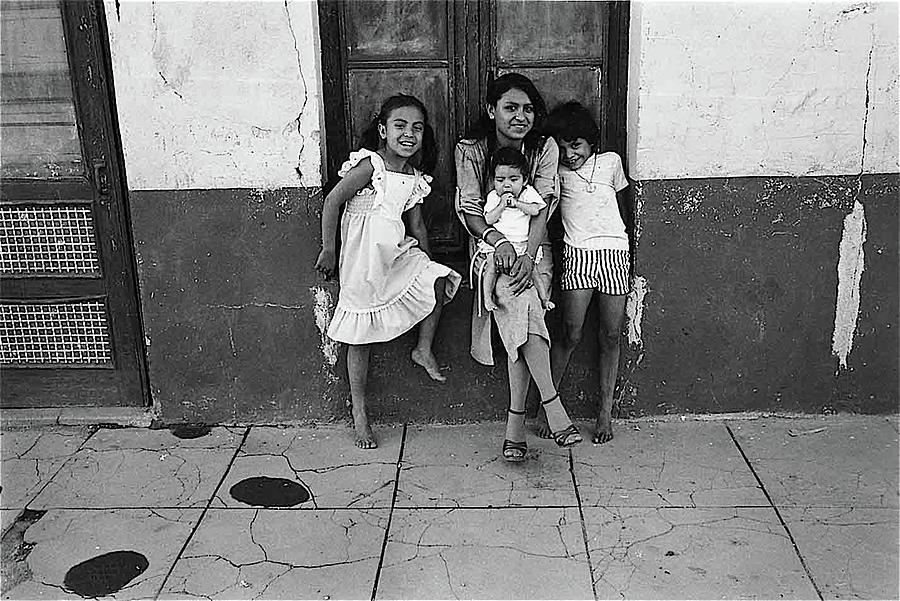 Family along a wall US Mexico border town Naco Sonora Mexico 1980 ...