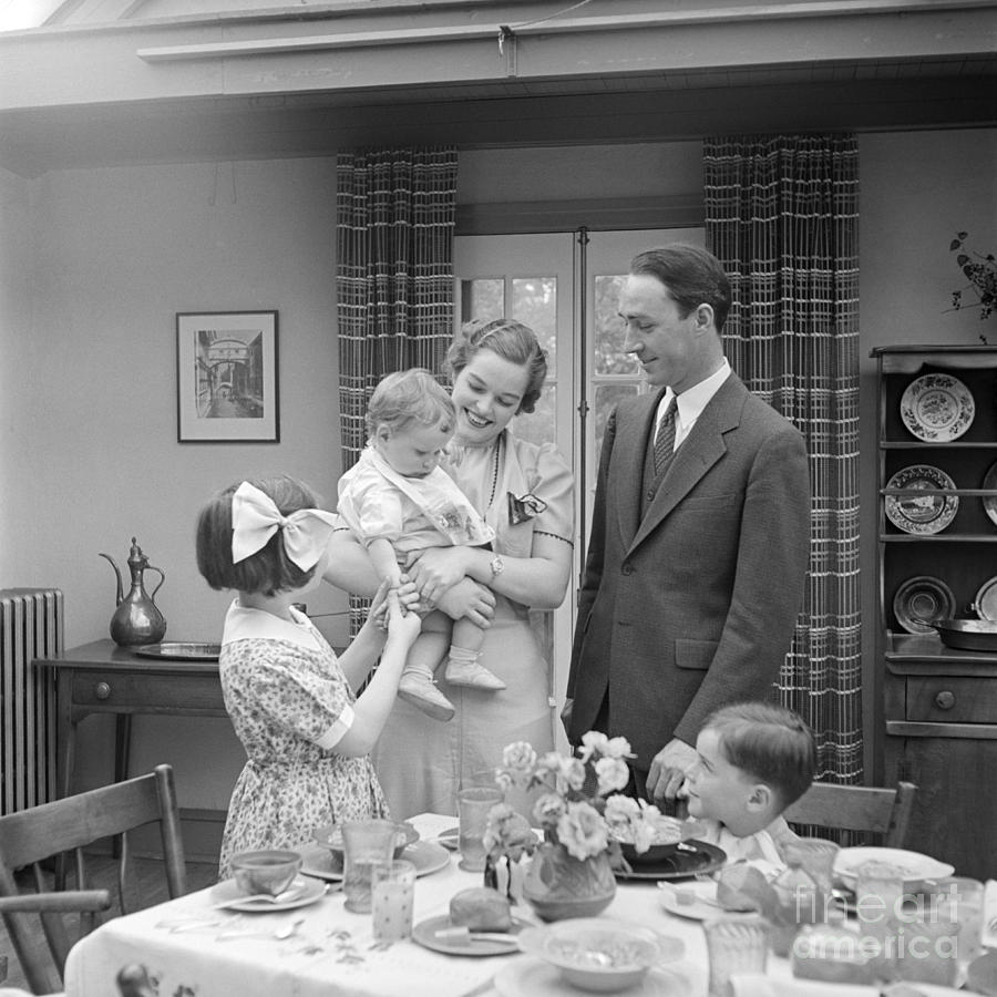 Family In Dining Room, C.1930s Photograph by H. Armstrong Roberts/ClassicStock