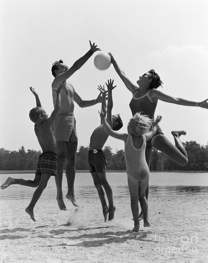 Family Playing Beach Volleyball, C.1960s Photograph by H. Armstrong Roberts/ClassicStock