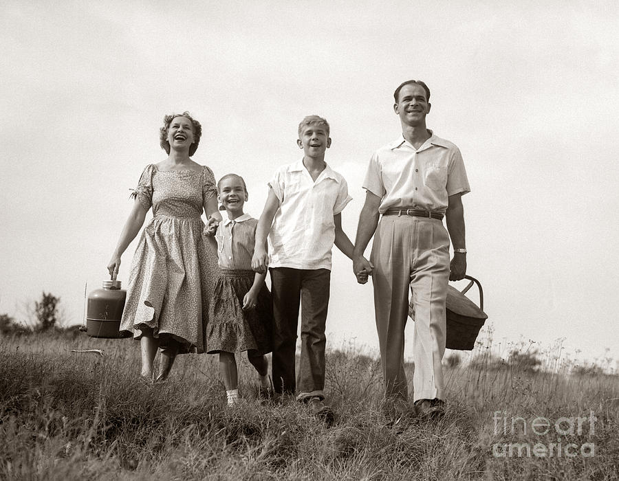 Family Setting Out For A Picnic, C.1950s Photograph by Debrocke/ClassicStock