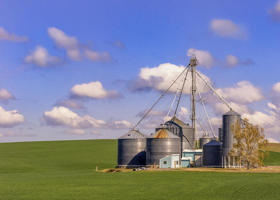 Farm with grain storage silos Photograph by John Trax