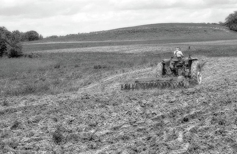 Farmer With Tractor Plowing Field Black And White Photograph