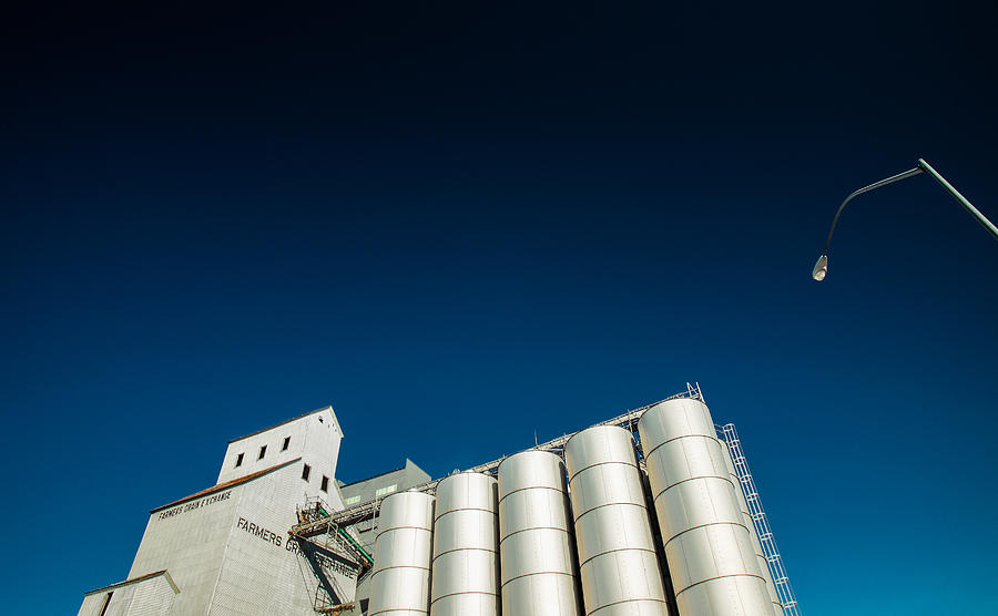 Grain Elevator Photograph - Farmers Grain Exchange by Todd Klassy