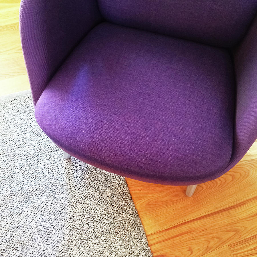 Furniture Photograph - Fashionable purple armchair on wooden floor by GoodMood Art