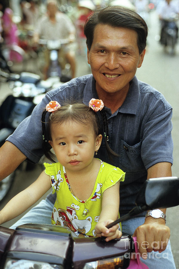 Vietnam Photograph - Father And Daughter by Rick Piper Photography