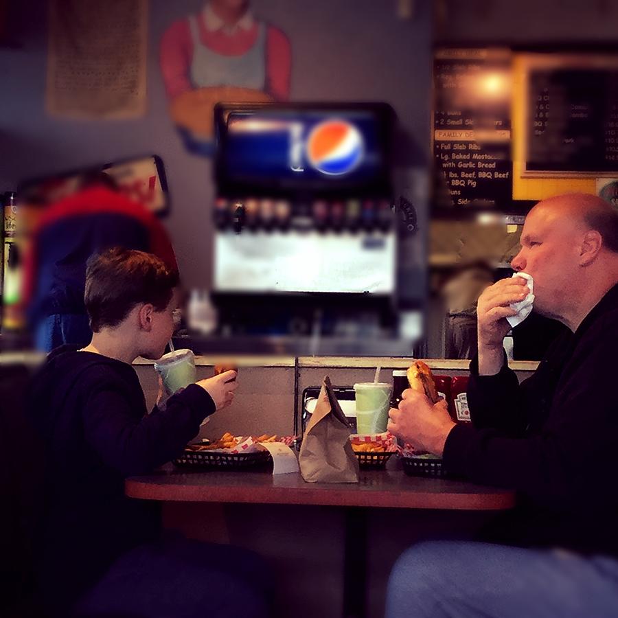 Father Photograph - Father and Son Burger Time by Frank J Casella Father Photograph - Father and Son Burger Time by Frank J Casella