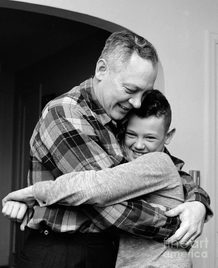 Father And Son Embracing, C.1950-60s Photograph by H. Armstrong Roberts/ClassicStock