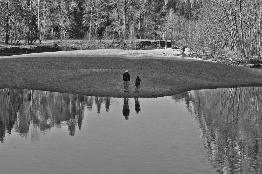 Father And Son Reflected Photograph by Priya Ghose