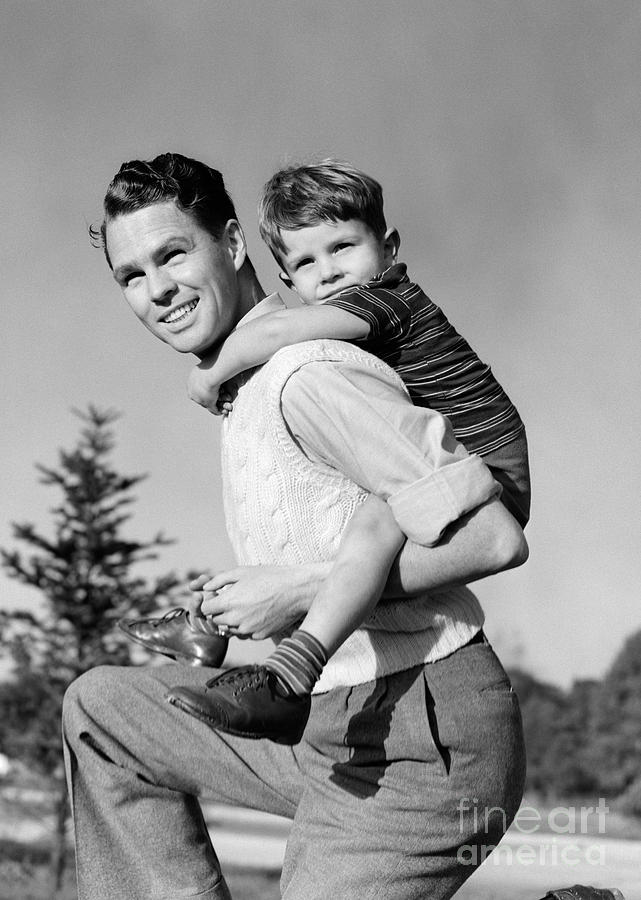 Father Carrying Son On Back C1940s Photograph By H Armstrong Robertsclassicstock Fine Art 6024