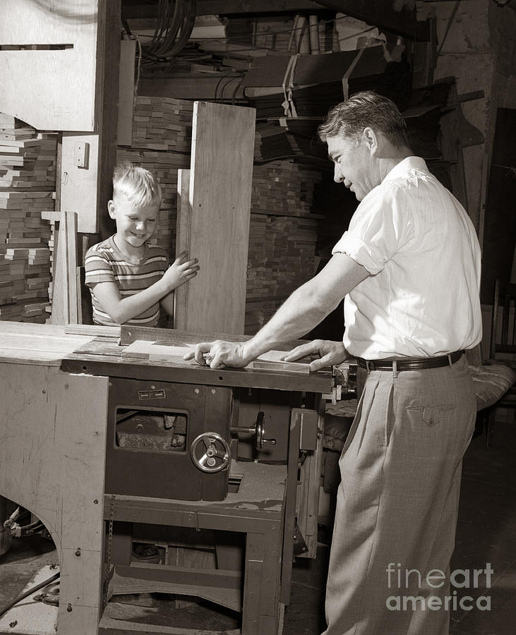 Father Teaching Son About Carpentry, C Photograph by Debrocke/ClassicStock