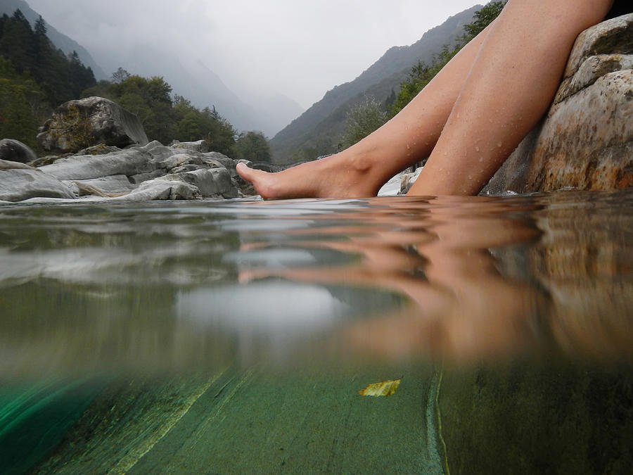 Feet on the water Photograph by Mats Silvan